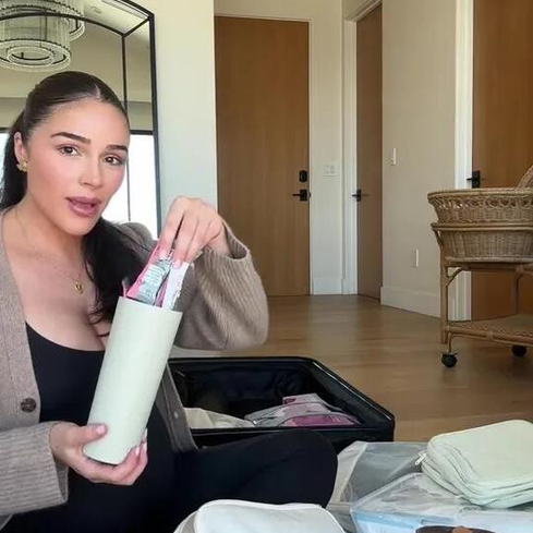     Olivia Culpo shows off her ultra-luxury hospital bag essentials in a viral TikTok, featuring everything from candles to collagen sticks—because giving birth shouldn't mean sacrificing spa vibes.