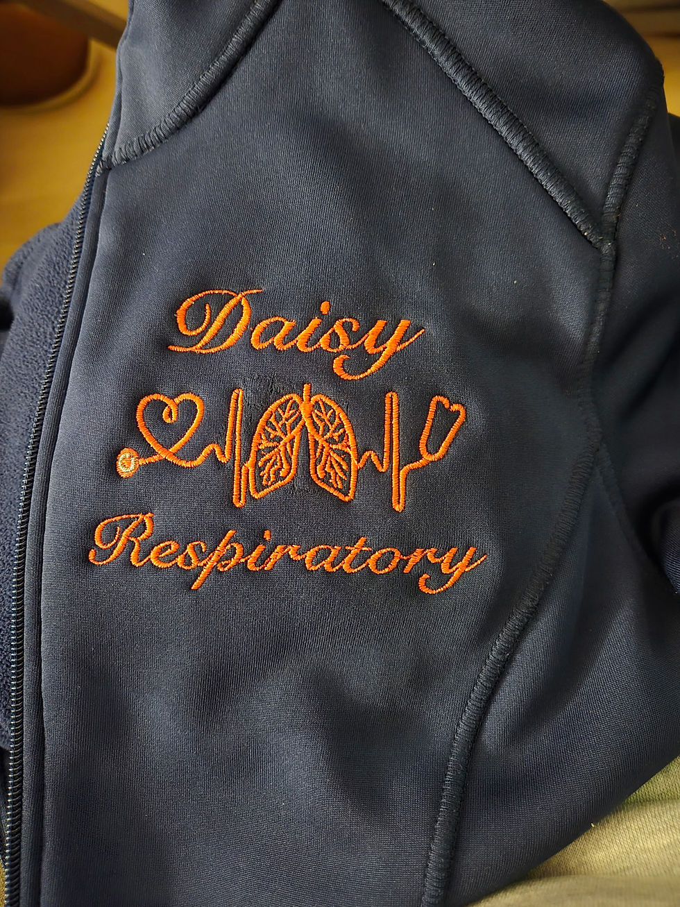 Thumbnail: Custom respiratory therapist scrub embroidery