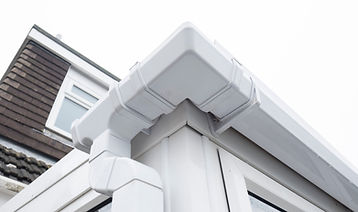 Cleaned white plastic pvc gutters and drain pipes that were blocked and full of green moul