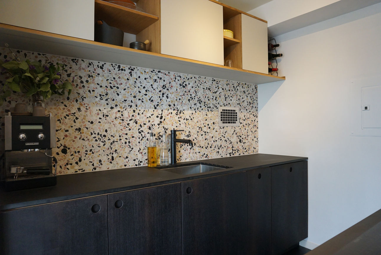 Kitchen remodel including custom reform cabinets. Concrete Collaborative terrazzo backsplash, design build process