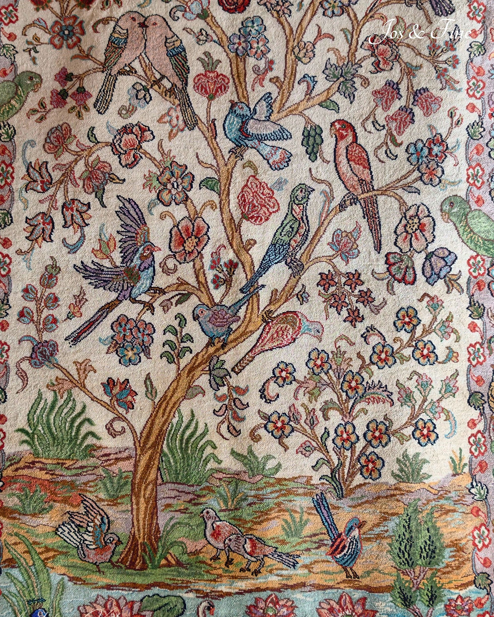 Thumbnail: Tree of Life centrepiece from Jos and Fine's Eden of Birds design, showing hand-knotted birds on flowering branches.