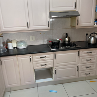 Before Cluttered cooking area