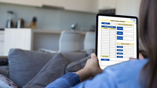 Christian female entrepreneur looking at her finance