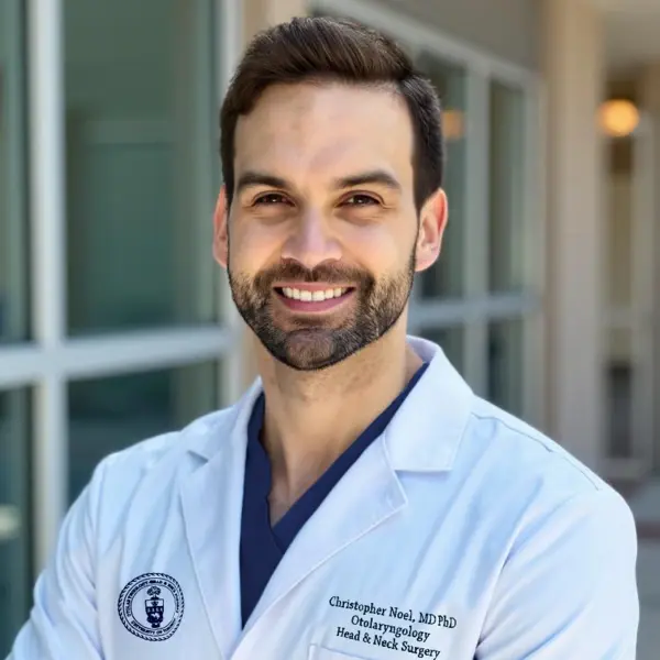 Dr. Christopher Noel at Noel Labs in white coat