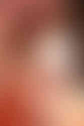 Woman Smiling At Camera In Pink Lit Room, Inspired By Harry Styles Fine Line.