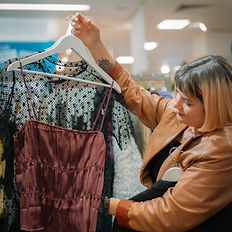 Fashion stylist showing styled outfit 