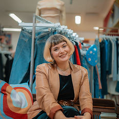 Fashion stylist, Clothemod, smiling at the camera