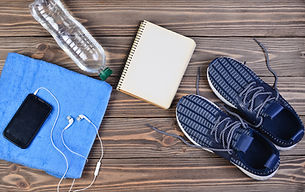 Sports accessories are spread out on a w