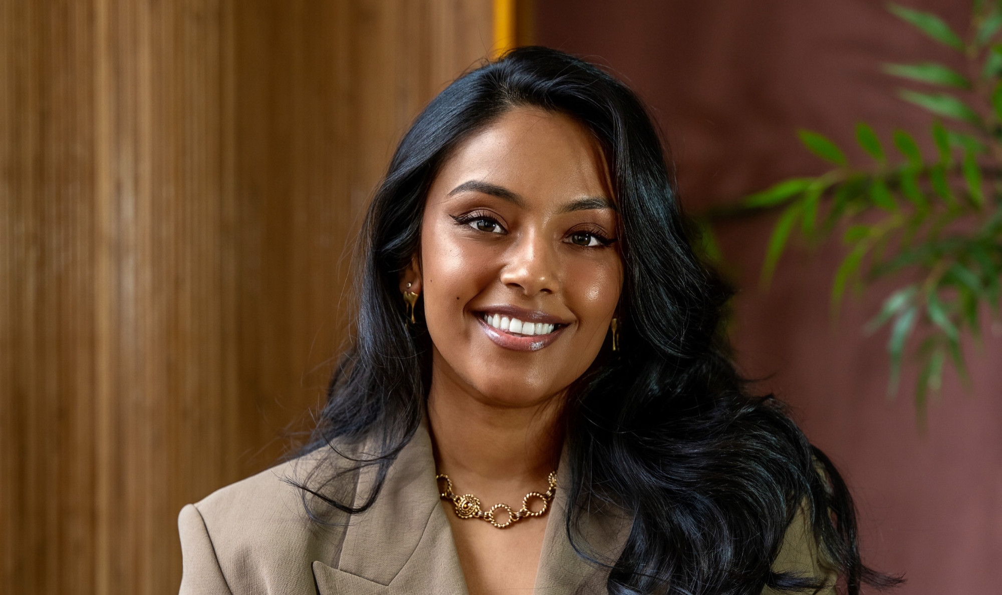 Monesha Chari, South Asian therapist, in a studio headshot with a calm, welcoming expression, reflecting South Asian therapy in NYC | immigrant therapy nyc - immigrant grief therapy nyc - south asian therapist nyc