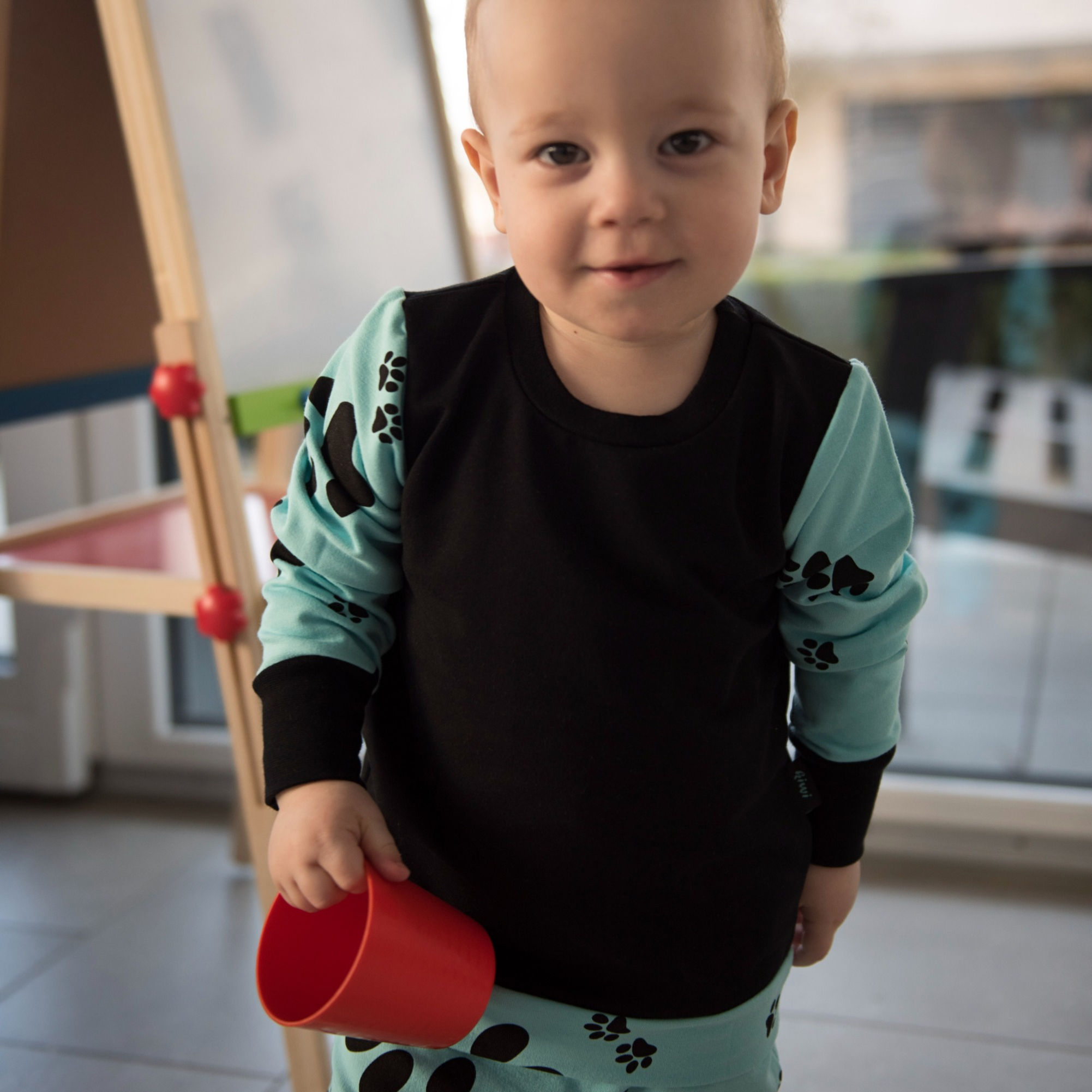 Pull menthol, pattes noires