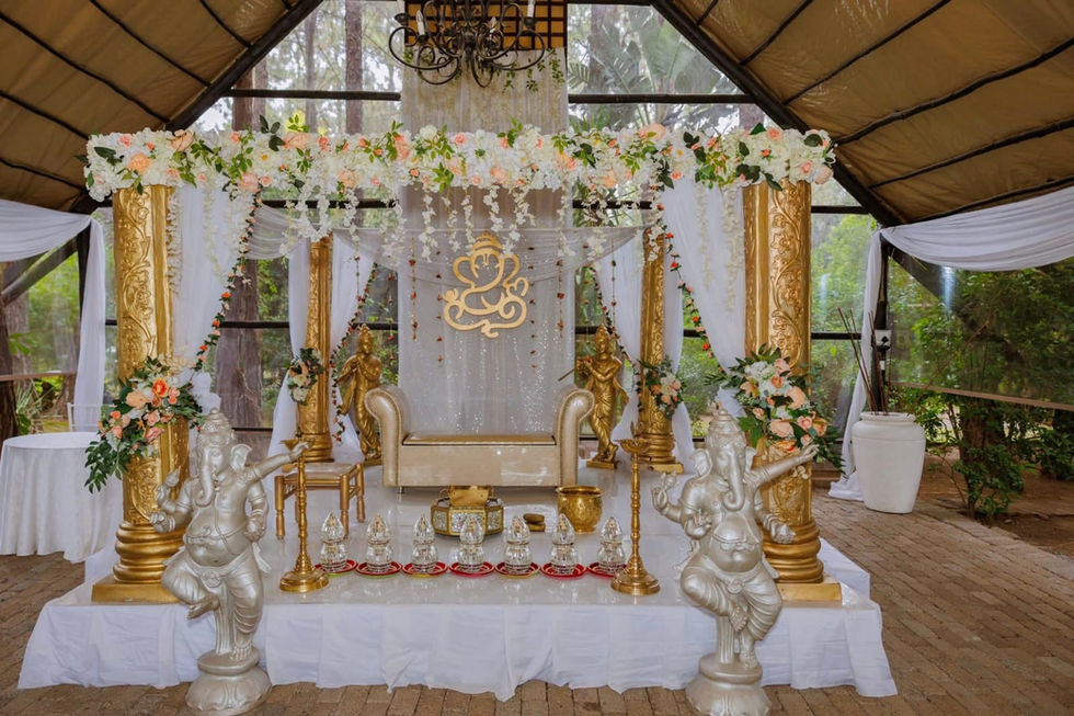 Elegant floral and gold-themed decorative swing setup.