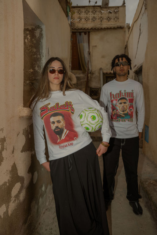 Model with Salah T-shirt and Hakimi T-shirt