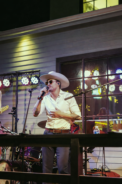 Champagne Nights singer on stage