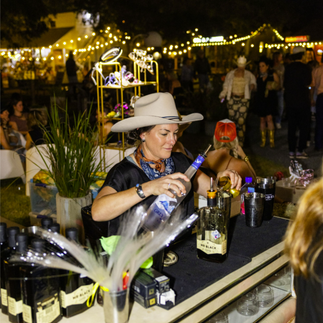 Pouring Drinks at Ellis Motel Wild, Wild, West party