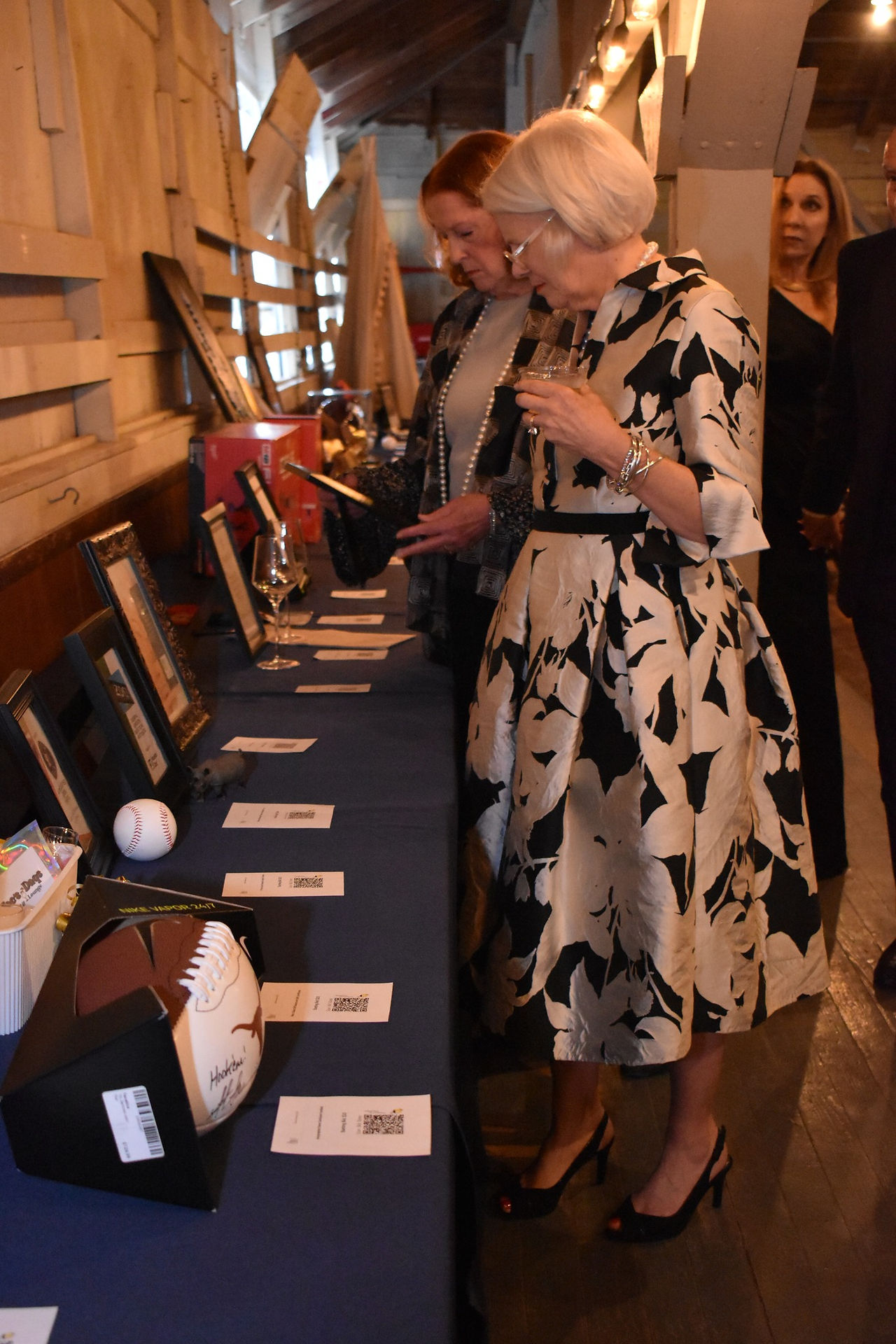 Silent auction before Satellite band, of Stargazer Productions, performs.