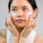 Applying Face Cream