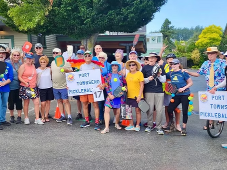 Pickleball Club Makes Colorful Splash at Uptown Street Fair Parade