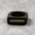 Walnut wood signet ring with brass inlay, front view
