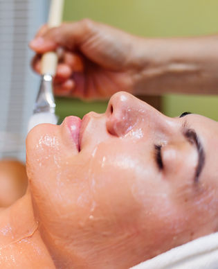 young-woman-lying-cosmetologist-s-table-during-rejuvenation-procedure (1).jpg