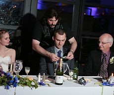 Magic of Marco performing interactive strolling magic for guests at a corporate event