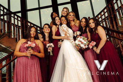 Bride and her bridesmaids holding their bouquets