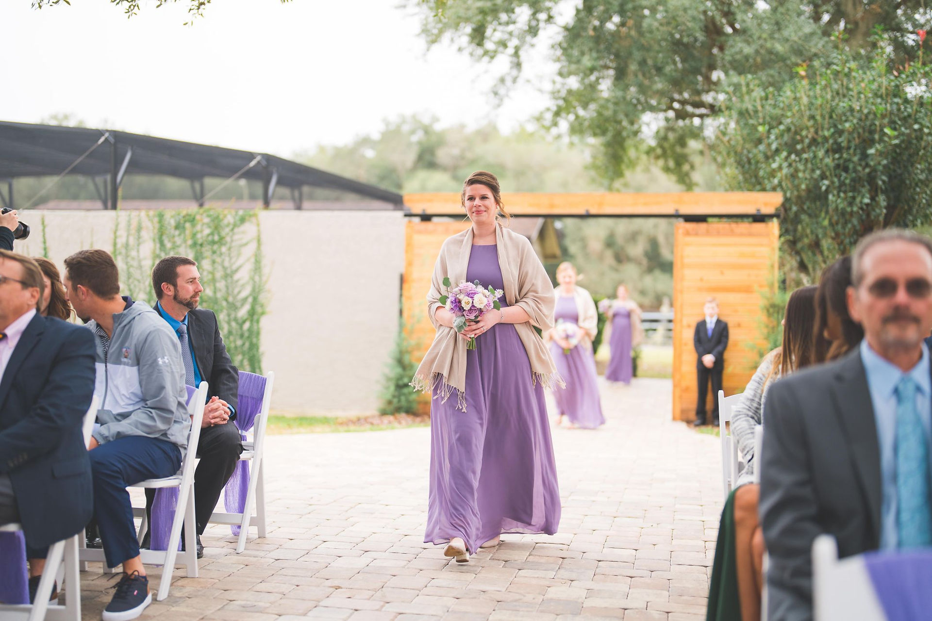 Bridesmaids in purple dresses