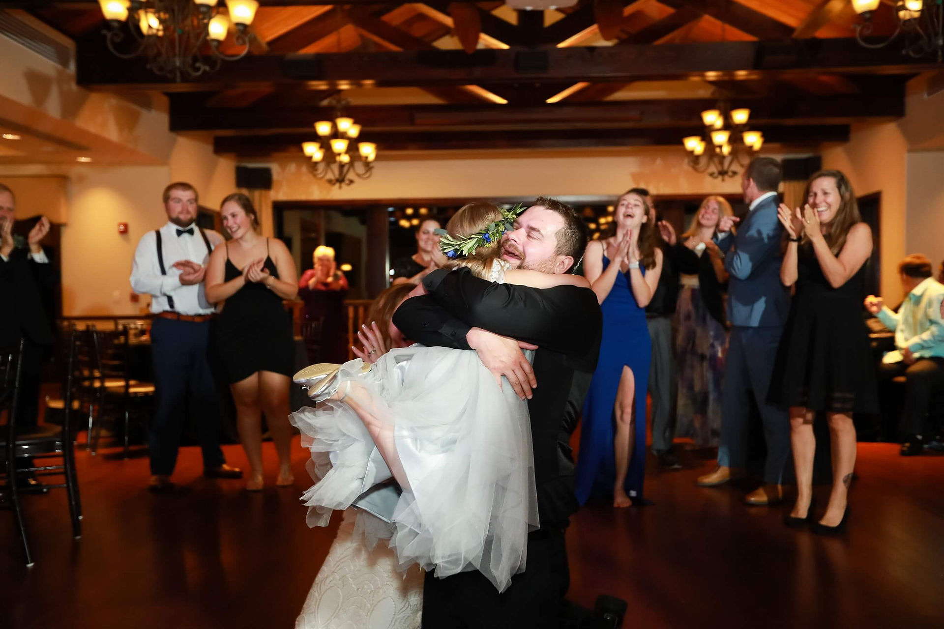 Greem embracing the flower girl
