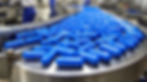 blue-capsule-production-line-pharmaceutical-factory.jpg