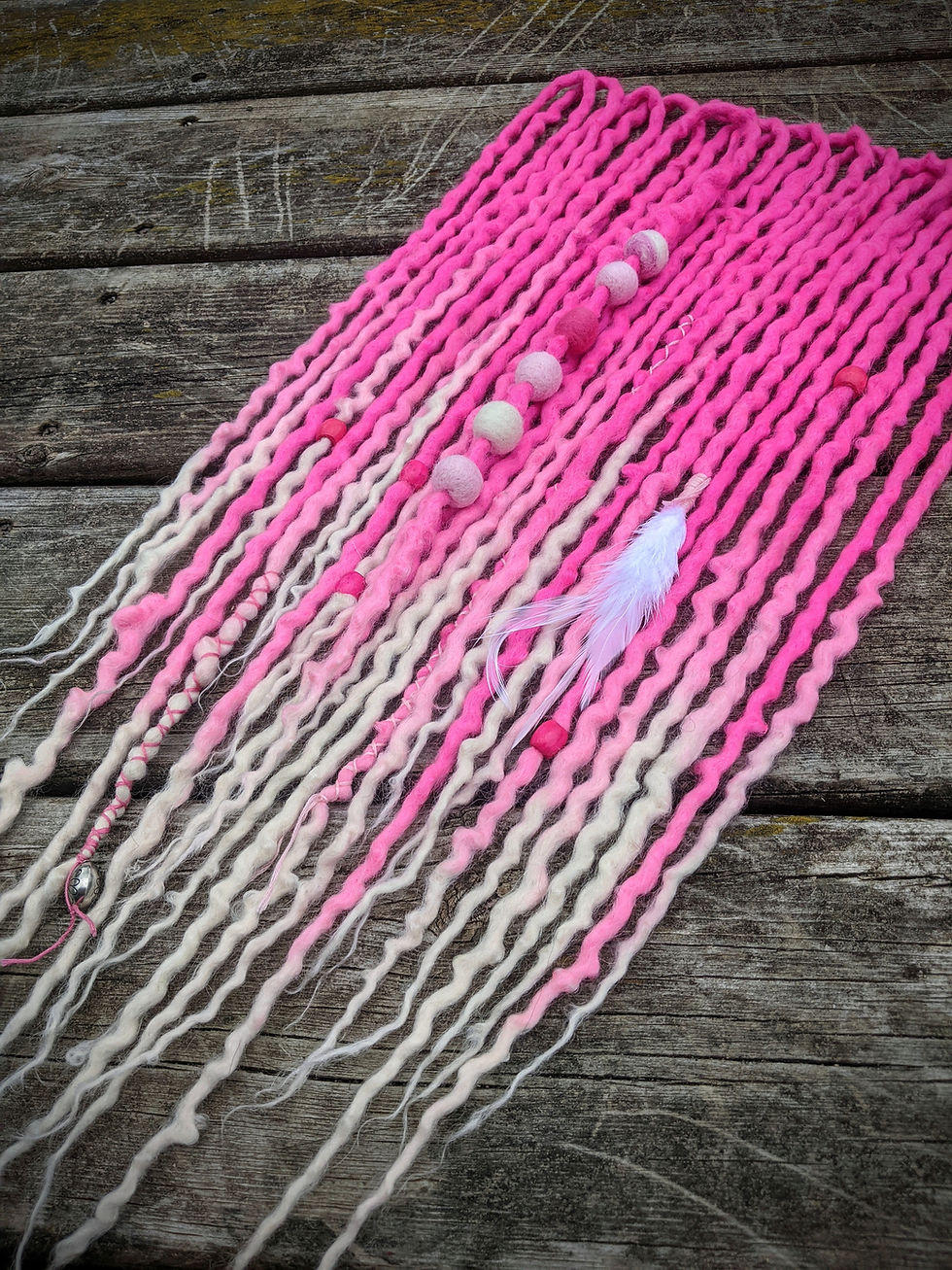 Thumbnail: Hot in Pink Partial Set of Wool Dreadlocks
