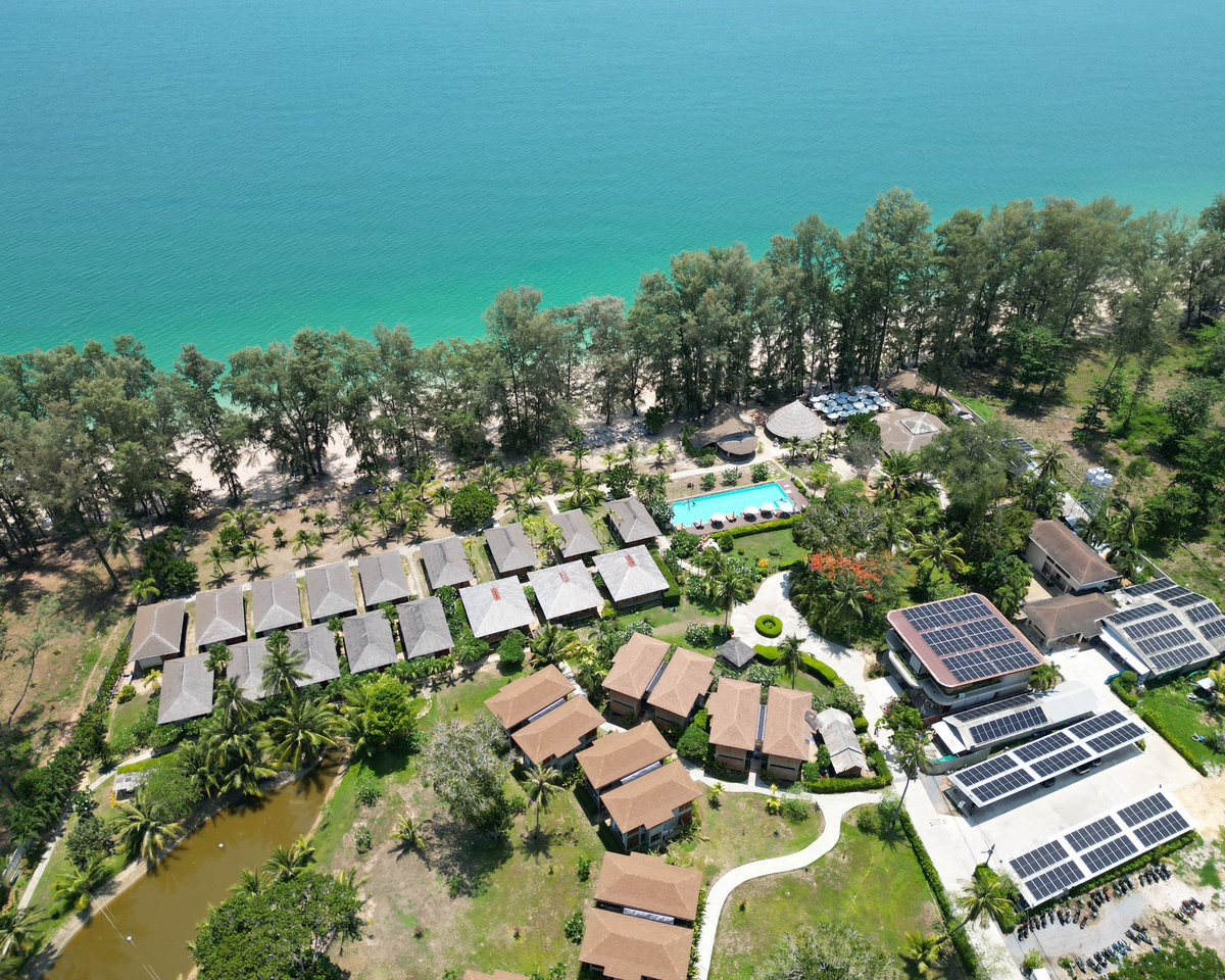 Aerial view of the estate between gardens and sea
