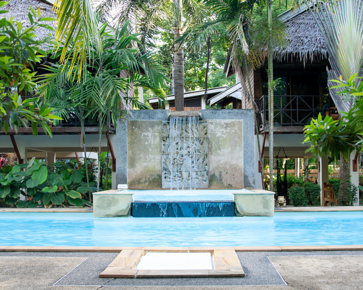 Garden pool with waterfall feature