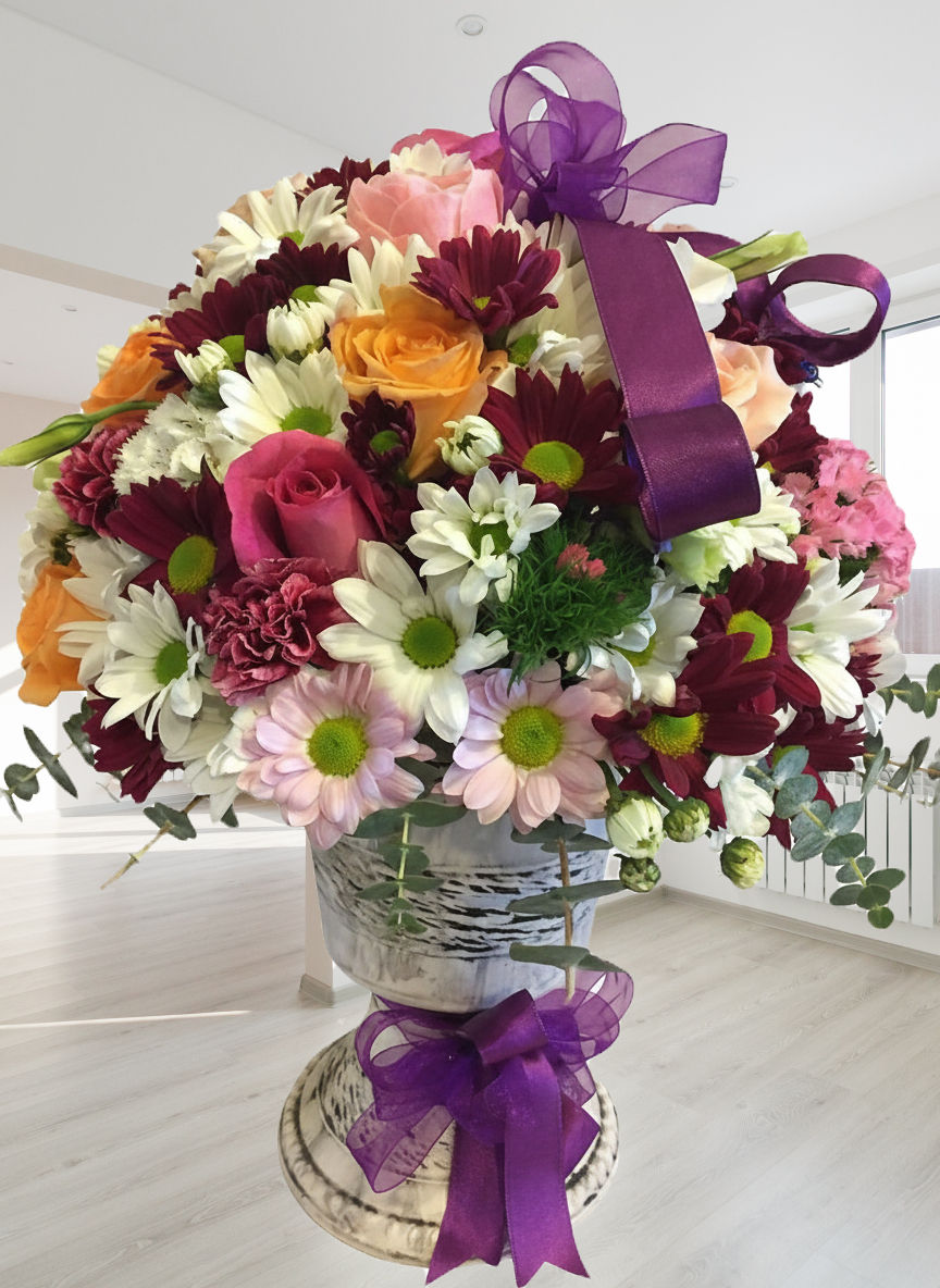 Küçük resim: Kupada mevsim çiçekleri 