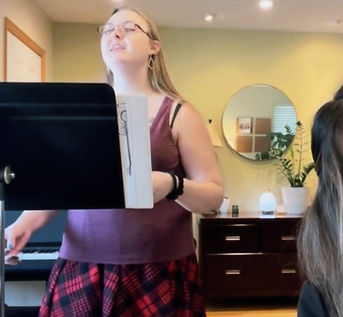 Adult Singer Singing her favorite songs in an In-Person adult voice lesson at Musical Minds Music Studio