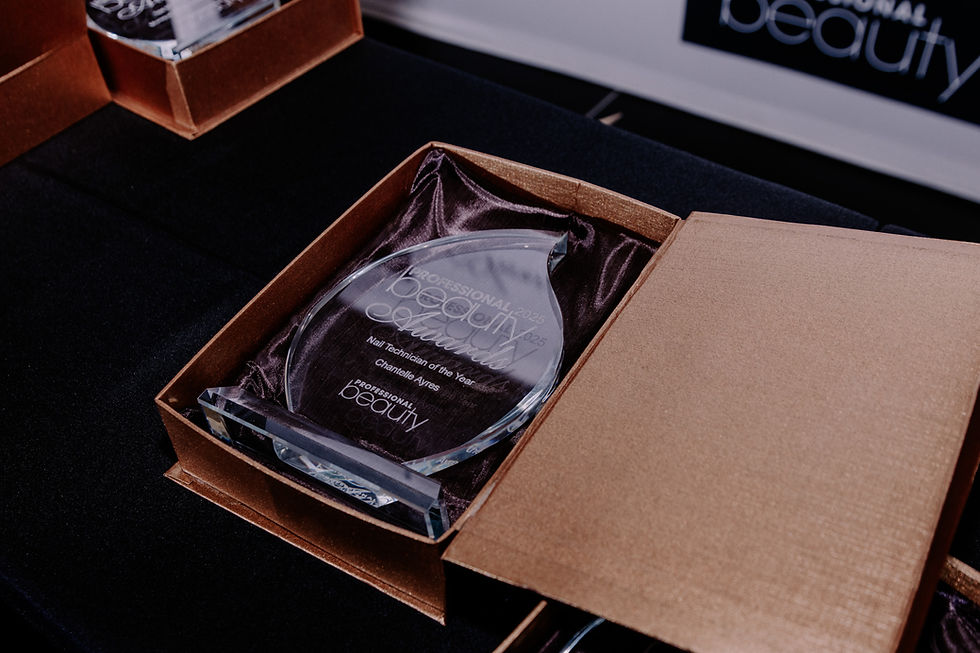 Glass award plaque in a brown presentation box on black velvet, engraved Professional Beauty Awards 2025 Nail Technician of the Year
