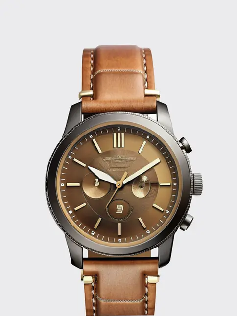 Vintage-inspired watch with brown dial and tan leather strap