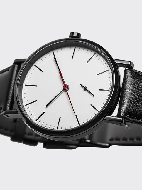 Black watch, white dial, red second hand