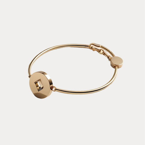 Gold disc bracelet with small square cutout