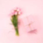 Pink tulips with a gift box on a light pink background, Template 36