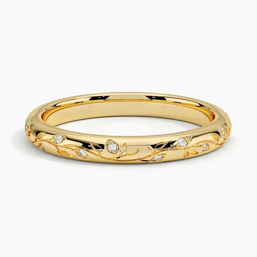 Gold eternity ring with leaves and diamonds
