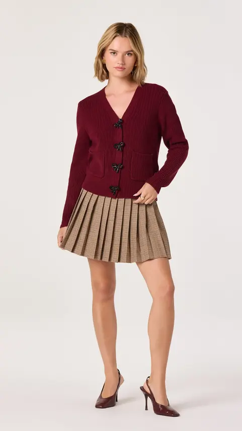 Jackeline Asymmetrical Scarf Cardigan paired with pleated skirt