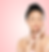 Asian woman with closed eyes, touching face, in front of pink background.