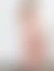 Woman wearing floral print dress posing for a fashion shot Charme.