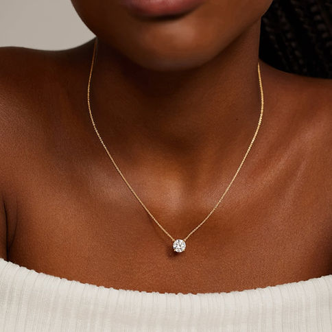 Woman wearing a sparkly diamond pendant necklace