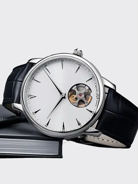 Vintage-inspired watch with white dial and visible movement