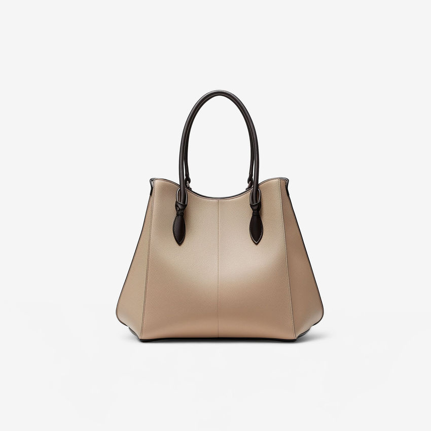 Beige handbag with black handles against a white background; daily use bag.