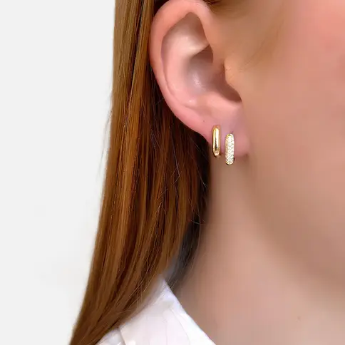 Close-up of gold hoop earrings