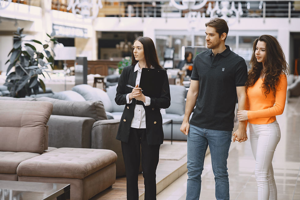 couple-with-salesman-furniture-store.jpg