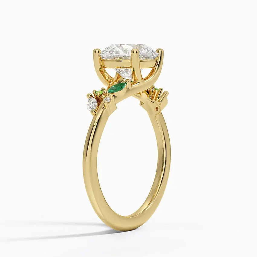 Gold eternity ring with diamonds and emeralds