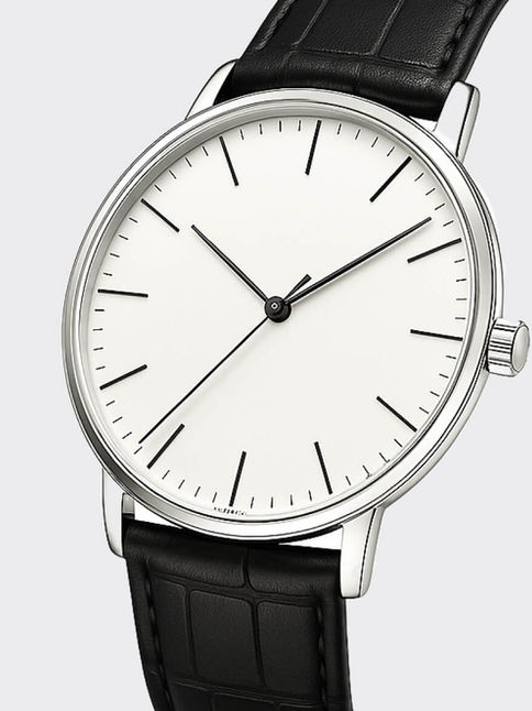 Vintage-inspired watch with white dial and black leather strap