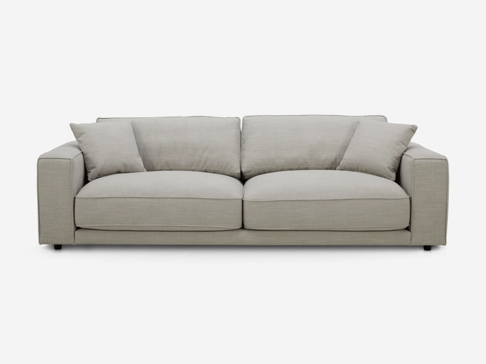 A modern, light gray couch. Perfect for any living room Template 37